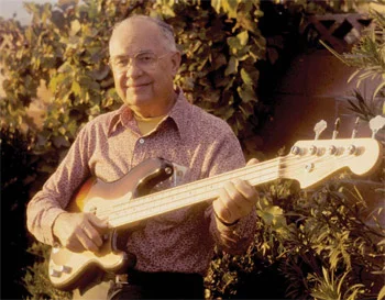 Leo Fender with a ‘58 Precision Bass, 1973.