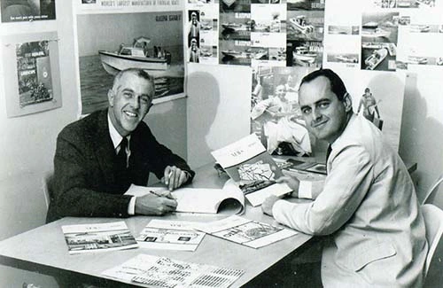 Bob Perine, on the right, and Ned Jacoby, on the left, at the Newport office