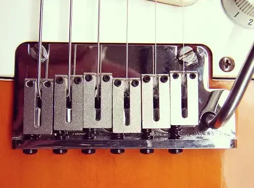The American Standard 2-Point Synchronized Tremolo, featuring the distinctive offset intonation screws