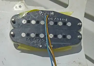 The dual-pickup configuration used on the humbucker version. All 1st and 2nd generation Fender Bullet pickups featured the code '016730' on the bottom plate, which was the Fender part number for the molded plastic bobbin