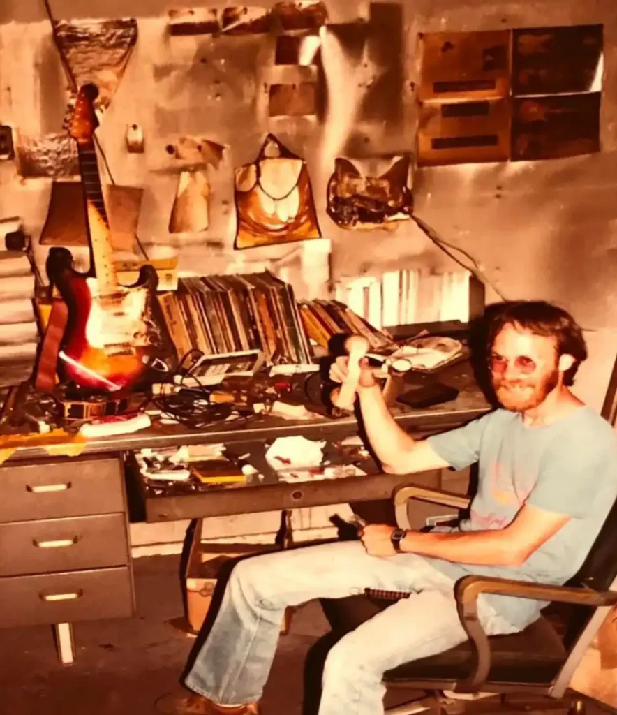 John Ziegler sitting at a desk after the fire