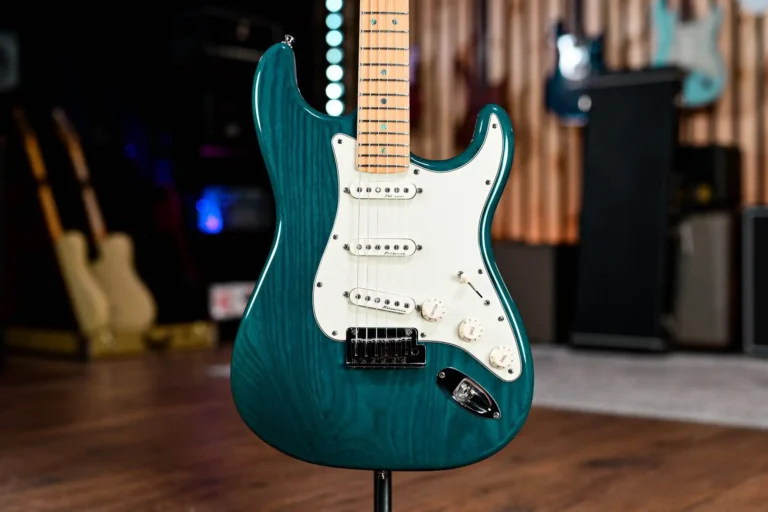 A Fender Deluxe Stratocaster in Teal Green Metallic