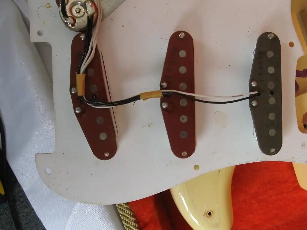 Two red Bottom and one grey bottom pickup on a 1982 '57 Stratocaster