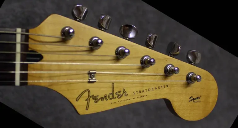 Headstock of the first version of the Fender Squier Series Stratocaster, made in Japan in the 1990s, featuring the Spaghetti logo