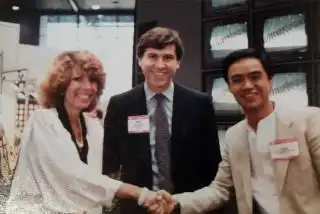 Roger Balmer, Fender Executive Vice president and wife, and Ace Nakata at the establishment of Fender Japan in 1982