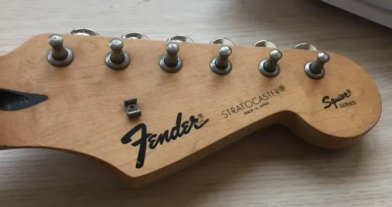 Headstock of the second version of the Fender Squier Series Stratocaster, made in Japan in the 1990s, featuring the Black Label logo