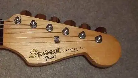 The unusual shape of the headstock on the Squier II Stratocaster, made in India