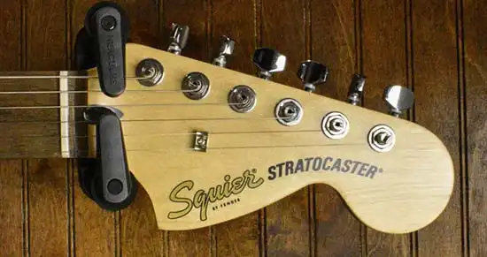 The new gold logo on the headstock of a 2021 Indonesian Affinity Stratocaster