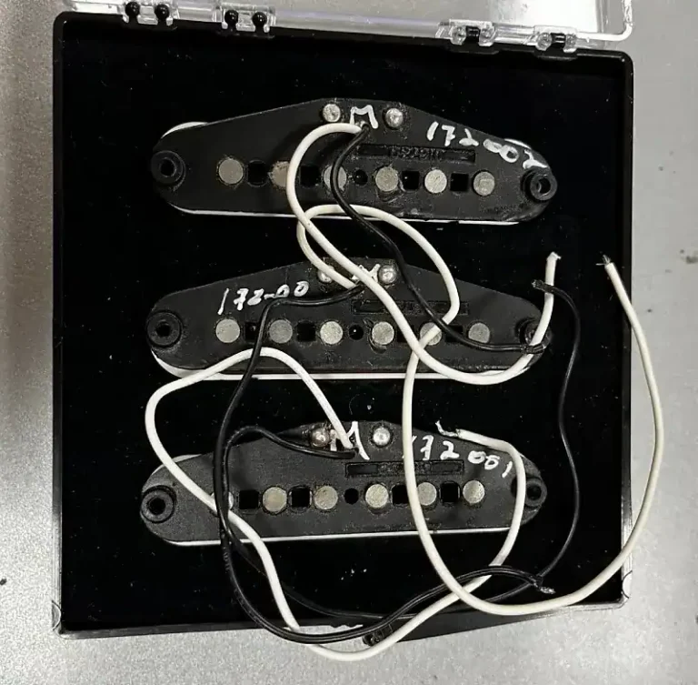 Classic ’50s Stratocaster pickups — note the white markings and stamped part number