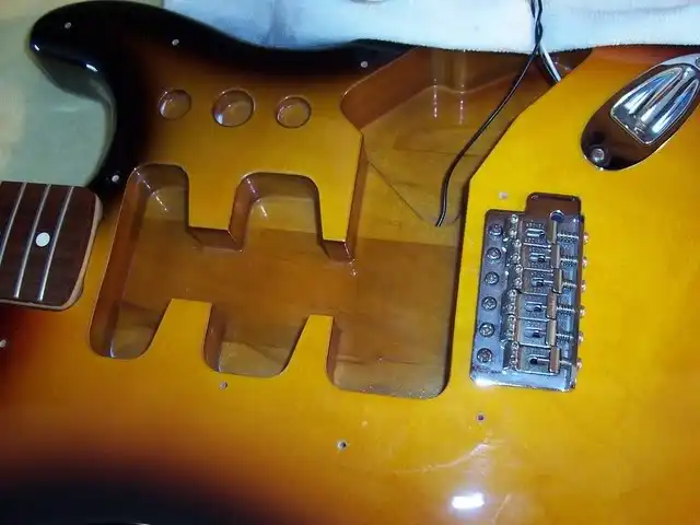 The cavities of this Standard Stratocaster body reveal its multi-piece construction