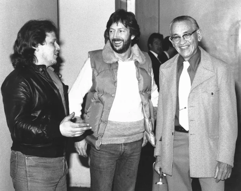 John Page and Freddie Tavares with Eric Clapton, 1983 (Courtesy of John Page)