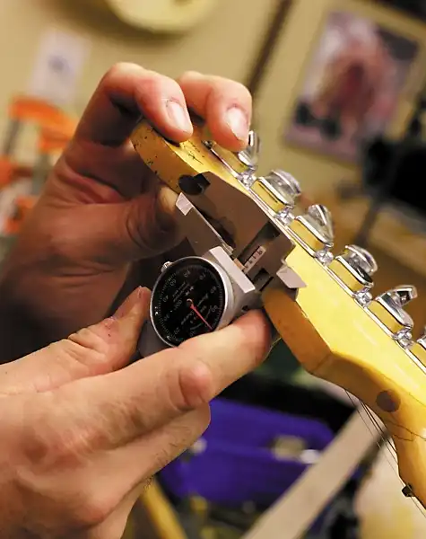John Cruz working on the prototype of the “Play Loud” Tribute Replica Stratocaster
