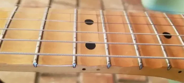 Poorly shaped scallops on the Japanese Standard Malmsteen Strat