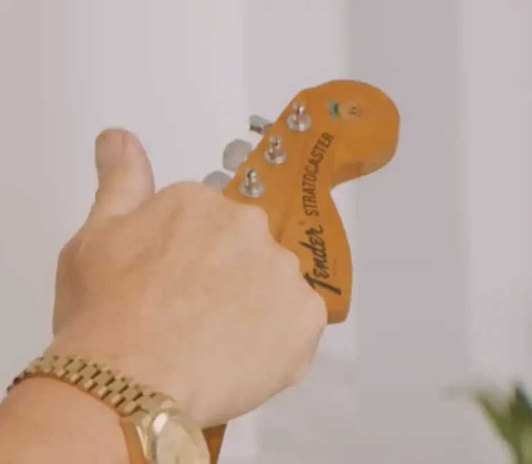The original Donald Duck sticker on the headstock of the “Play Loud,” as shown in footage from the Strat Session video
