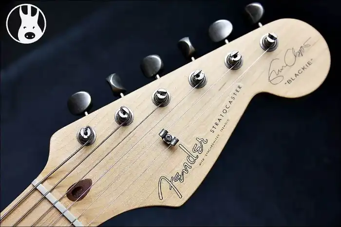 The word “Blackie” on the headstock of a black Eric Clapton Stratocaster