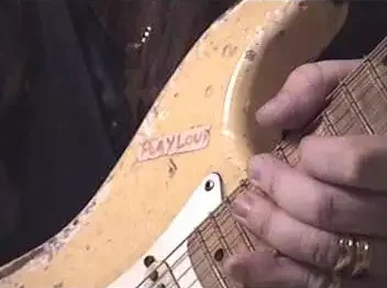 The original “Play Loud” sticker that gave the guitar its nickname, as seen in a 2022 video by Yngwie Malmsteen showcasing his collection
