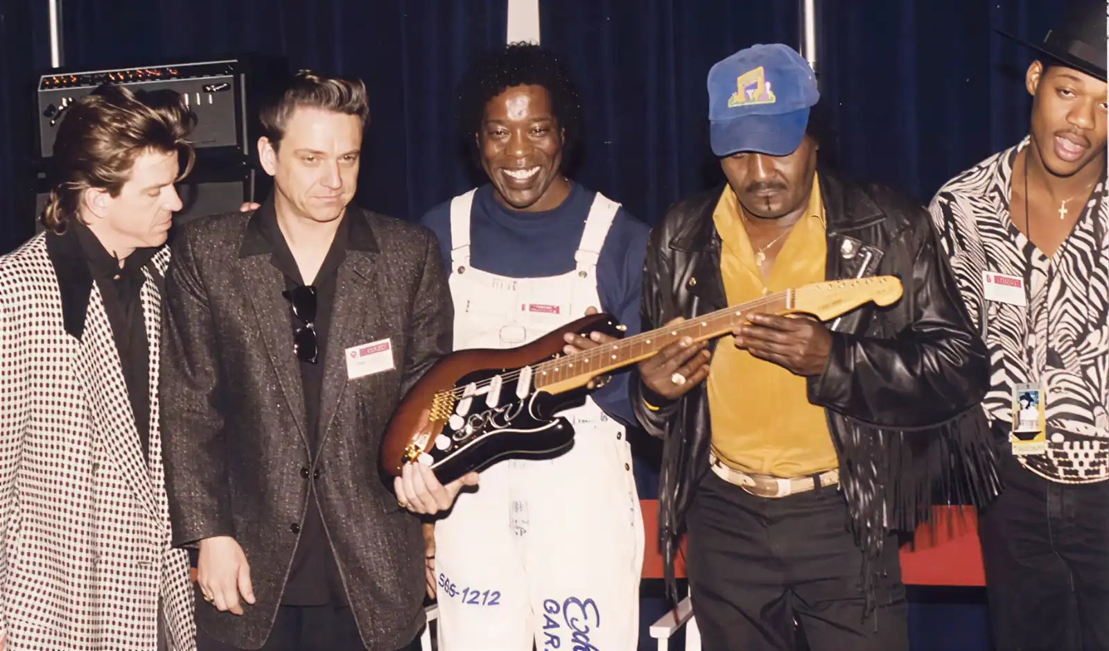 NAMM 1992: unveiling of the Stevie Ray Vaughan Signature Stratocaster, with Jimmie Vaughan, Double Trouble drummer Chris Layton, Buddy Guy, Albert Collins, and a young Eric Gales