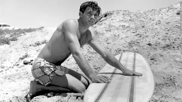 Dick Dale with a surfboard