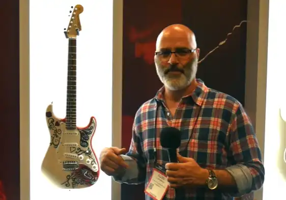 Fender Product Development Manager Allen Abbassi unveiling the Jimi Hendrix Monterey Stratocaster at the 2017 NAMM Show